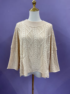 Cream sweater