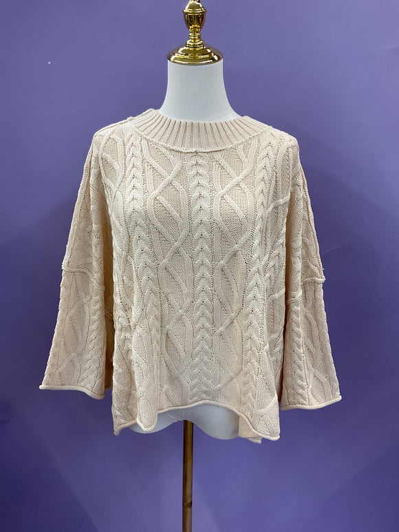 Cream sweater